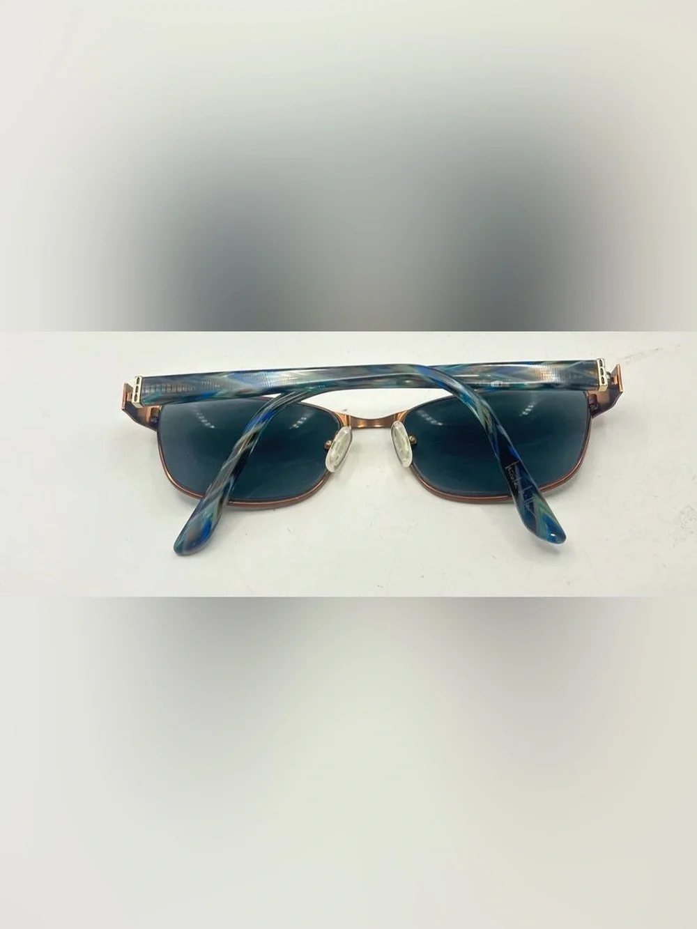 Nicole Miller listing pair
